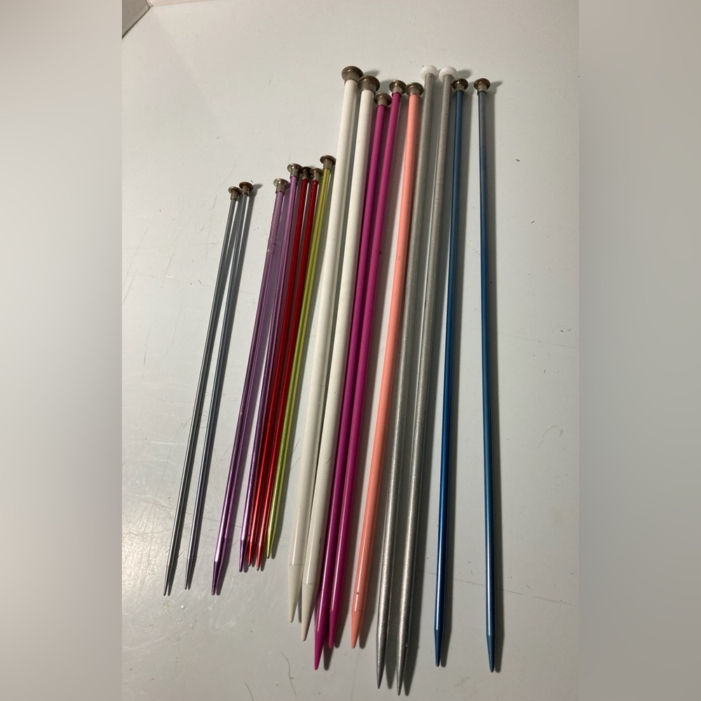 Variety of different size knitting needles. From 15" down to 10"
